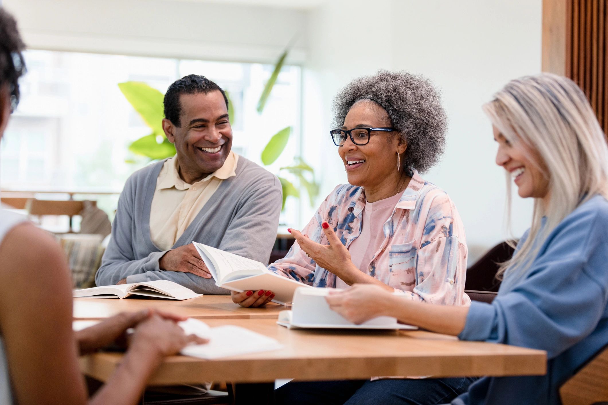 Small group discussion around a table